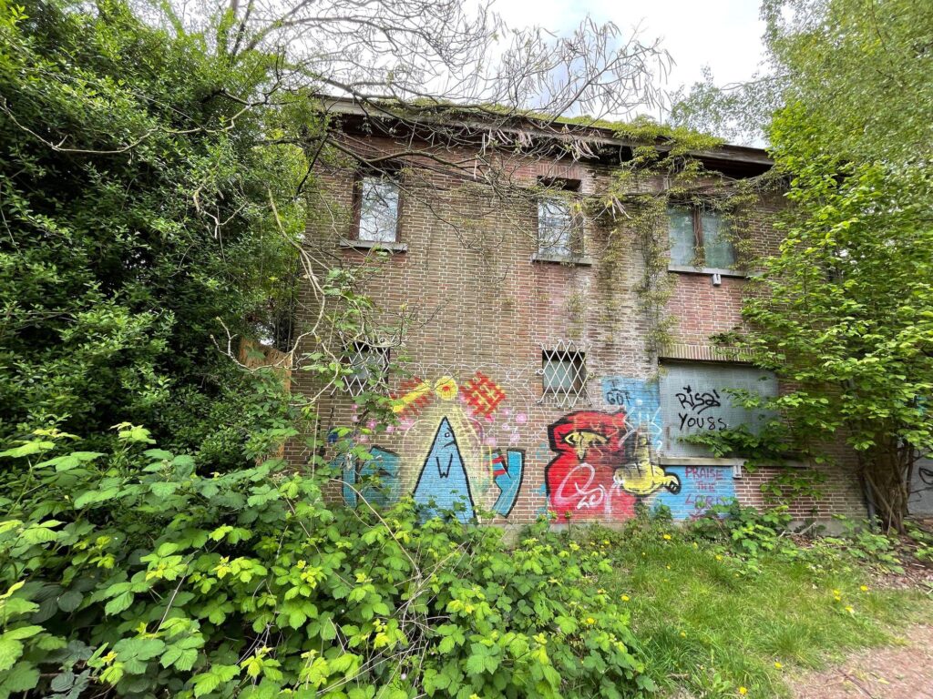 a photograph of a decaying house in a ghost town called doel