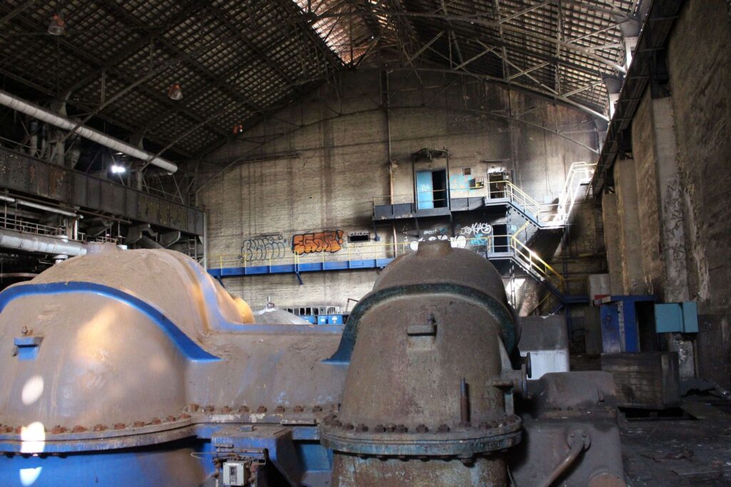 a photograph of the interior of a blower house at a blast furnace