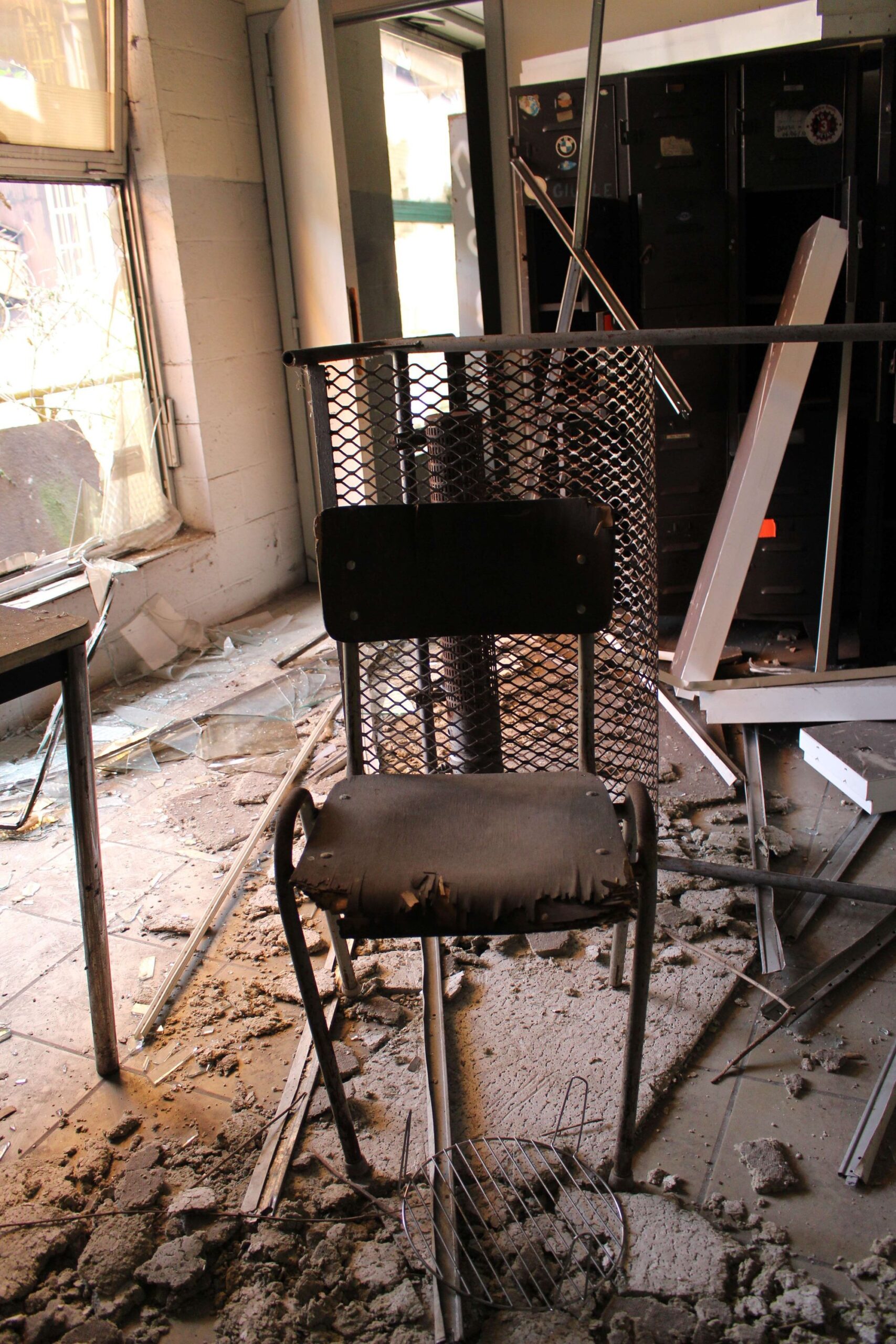 a photograph of a decaying chair in a former steel factory in belgium