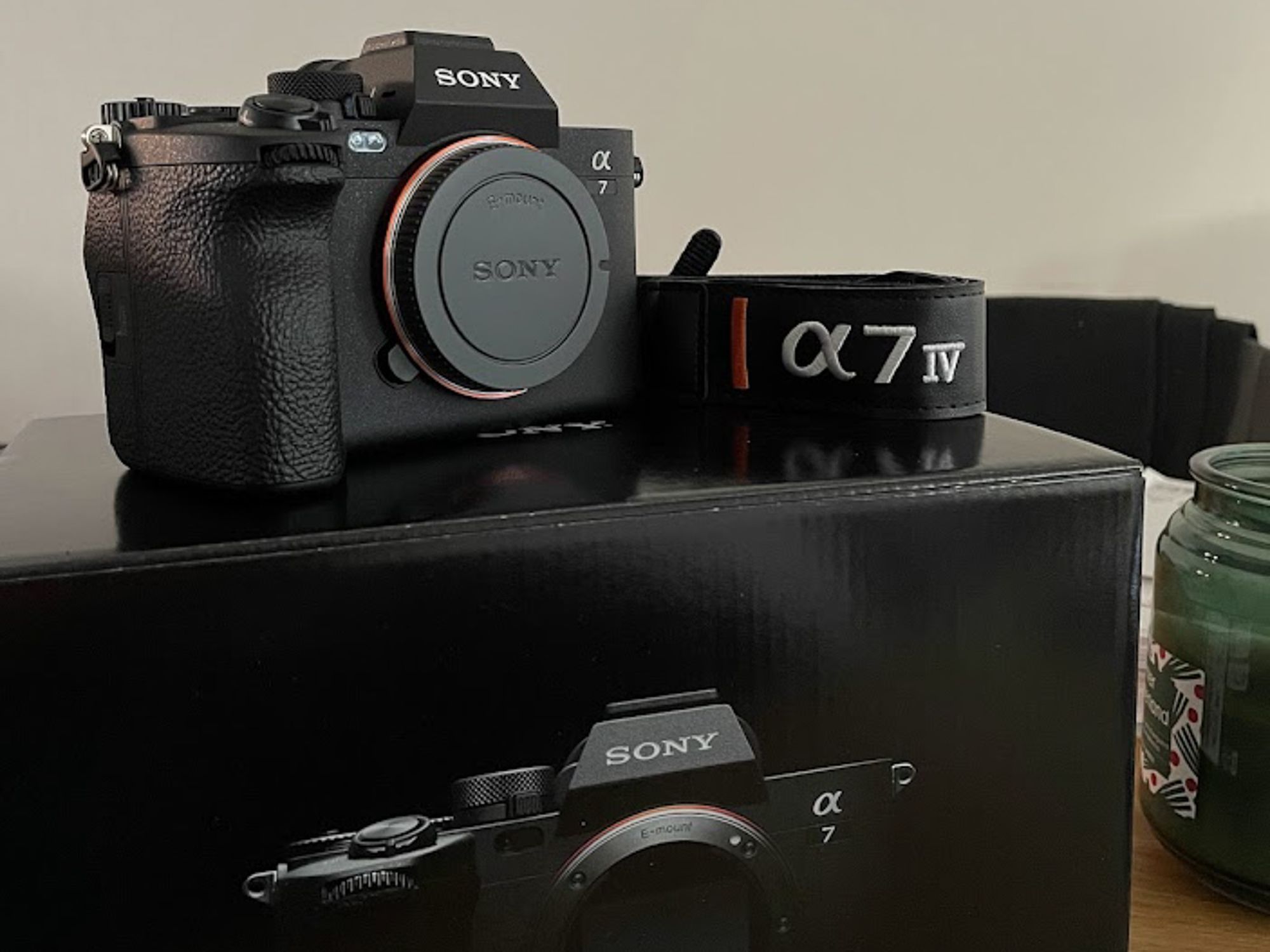 a photograph of a sony a7 iv camera on the box it came with