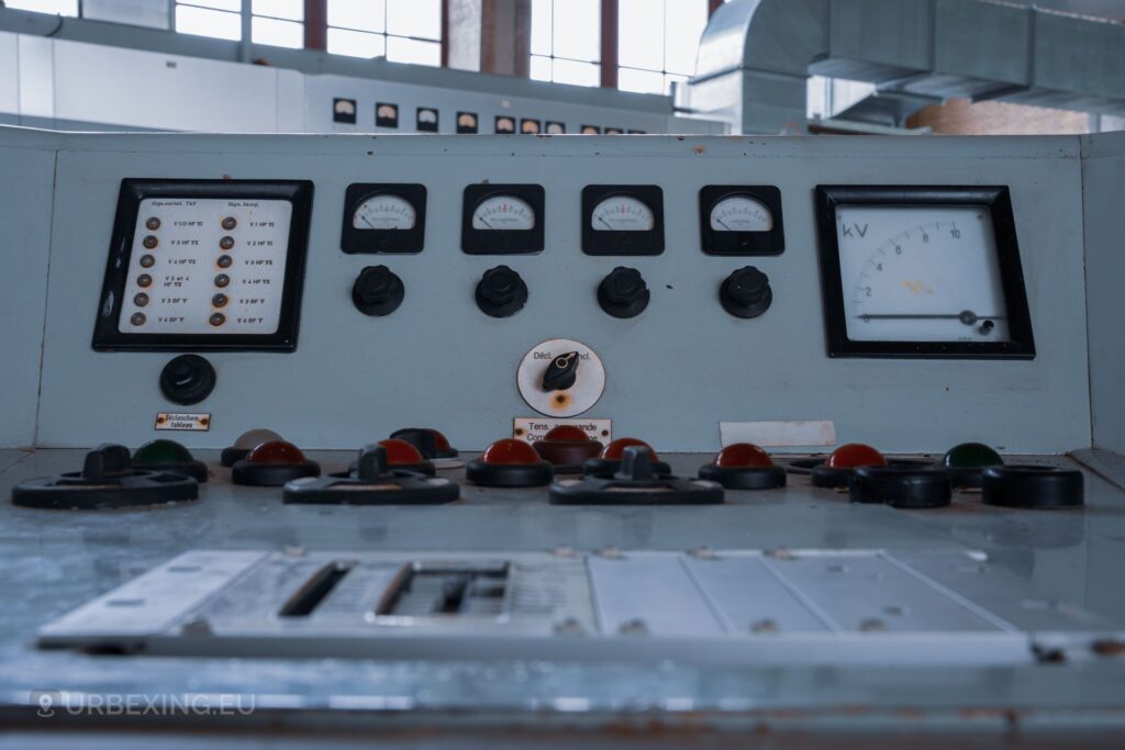 a picture showing several gauges, meters and button on a control panel found during urban exploration
