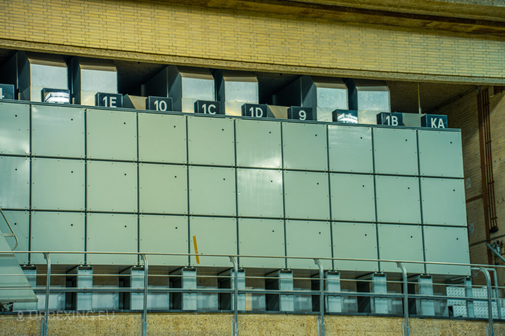 A closer look at the wall of control panels in the control room of "Lost Frequencies." The image shows numbered sections, industrial design elements, and some wear and tear, indicative of the facility's abandonment. This detailed view is a testament to the allure of urban exploring.