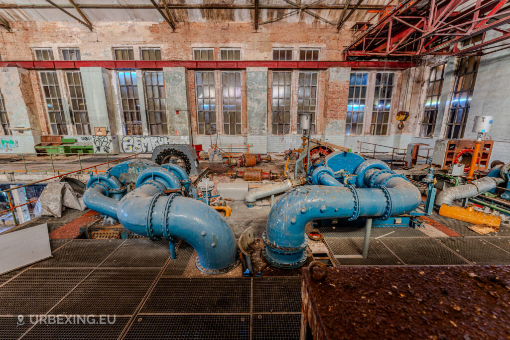 Pipes and compressors inside abandoned Bergwerk Niederberg